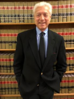 Mr. Kenneth Russell Mikos