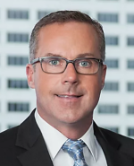Mr. Kevin M. Baucom