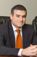 Mr. Kevin George Brick