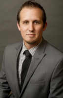 Kyle R. May