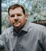 Mr. Lance E. Mullins