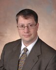 Lawrence W Falbe