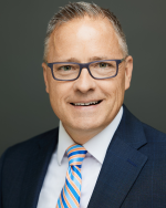 Mr. Mark D. Gott