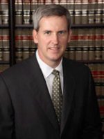 Mr. Mark E. Bishop
