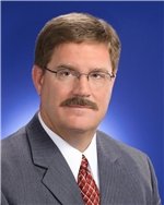 Mr. Mark L. Boos