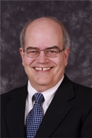 Mr. Mark Linton Schumacher