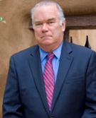 Mr. Mel E. Yost