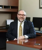 Mr. Michael E. Garland