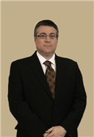 Michael H Shuster