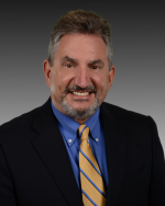 Mr. Richard C. Follender