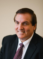 Mr. Richard K Glauser