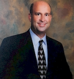 Mr. Robert Edward Burguieres