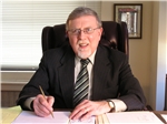 Robert G. Xides, Jr.