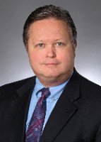 Thomas F McGuire