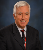 Mr. Thomas J. Buseck