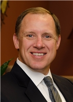 Thomas J. Houser