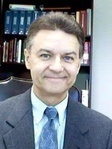 Thomas L Adams