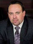 Travis J Tormey