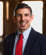 Travis M. Brennan, Esq.